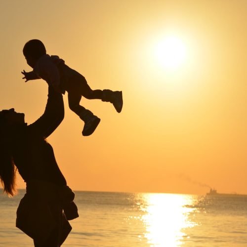Photo by Pixabay on <a href="https://www.pexels.com/photo/silhouette-photo-of-a-mother-carrying-her-baby-at-beach-during-golden-hour-51953/" rel="nofollow">Pexels.com</a>