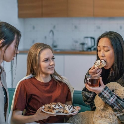 woman eating a lot of sugar