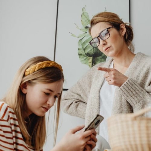 Photo by Karolina Grabowska: https://www.pexels.com/photo/mother-scolding-teenage-daughter-using-phone-6957246/