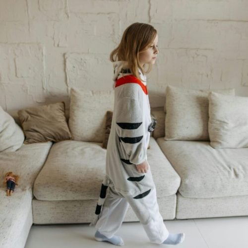 Photo by Pavel Danilyuk: https://www.pexels.com/photo/a-girl-wearing-sleepwear-walking-in-the-living-room-while-looking-afar-7653649/