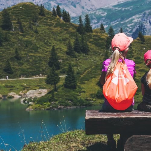 Photo by Susanne Jutzeler, suju-foto on <a href="https://www.pexels.com/photo/two-girls-sitting-on-brown-bench-near-body-of-water-1292006/" rel="nofollow">Pexels.com</a>