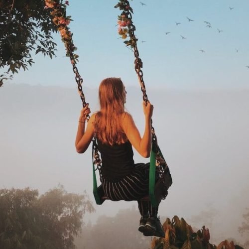 Photo by Afvzi on <a href="https://www.pexels.com/photo/back-view-photo-of-woman-swinging-2416972/" rel="nofollow">Pexels.com</a>