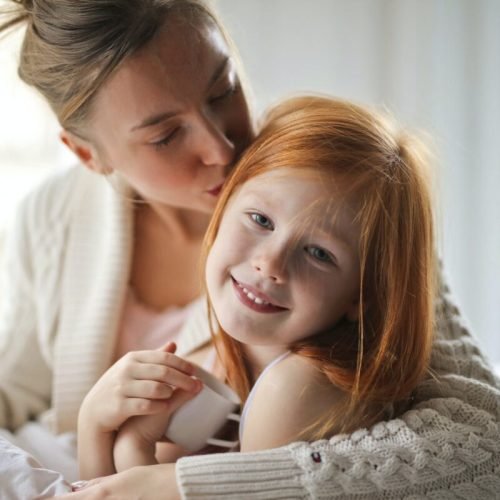 Photo by Andrea Piacquadio on <a href="https://www.pexels.com/photo/a-mother-kissing-her-child-3760279/" rel="nofollow">Pexels.com</a>