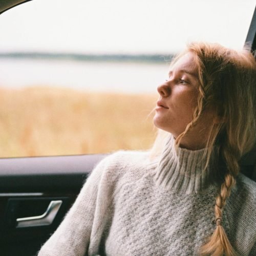 Photo by Anastasia  Shuraeva on <a href="https://www.pexels.com/photo/woman-in-sweater-sitting-inside-a-car-4091200/" rel="nofollow">Pexels.com</a>