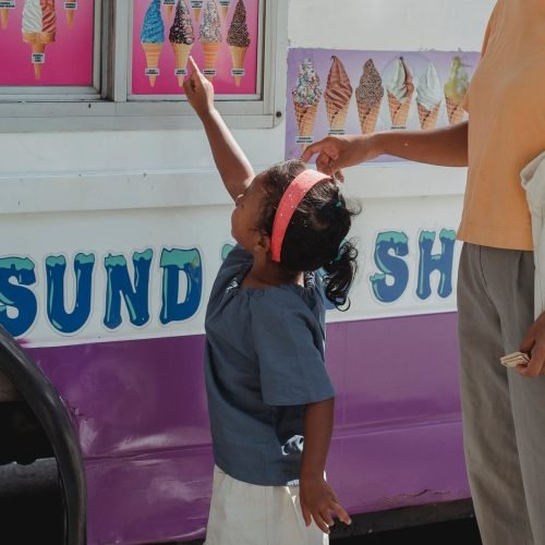Photo by Kamaji Ogino on <a href="https://www.pexels.com/photo/asian-girl-asking-for-ice-cream-5094375/" rel="nofollow">Pexels.com</a>