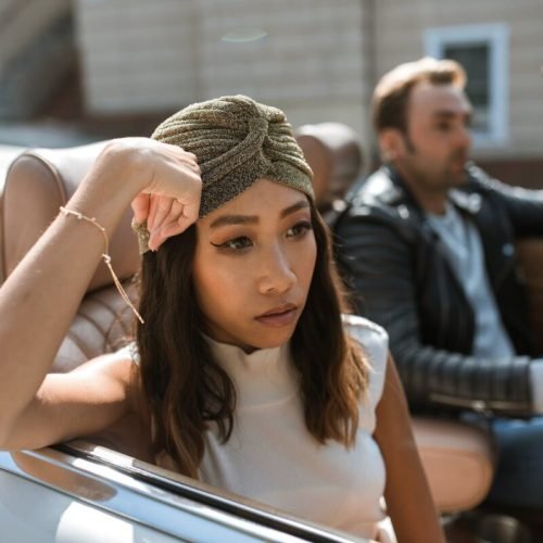 Photo by RDNE Stock project on <a href="https://www.pexels.com/photo/woman-in-white-tank-top-sitting-in-a-car-feeling-annoyed-5617714/" rel="nofollow">Pexels.com</a>