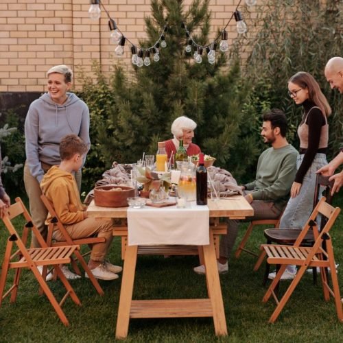 Photo by Askar Abayev on <a href="https://www.pexels.com/photo/family-having-picnic-on-terrace-5638612/" rel="nofollow">Pexels.com</a>