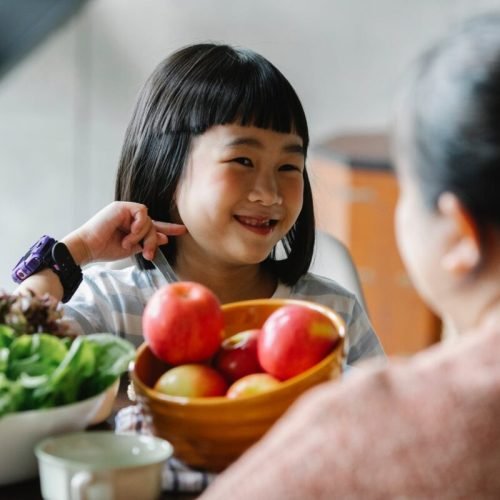 Photo by Alex Green on <a href="https://www.pexels.com/photo/smiling-funny-asian-girl-smiling-while-having-breakfast-with-mother-5692214/" rel="nofollow">Pexels.com</a>