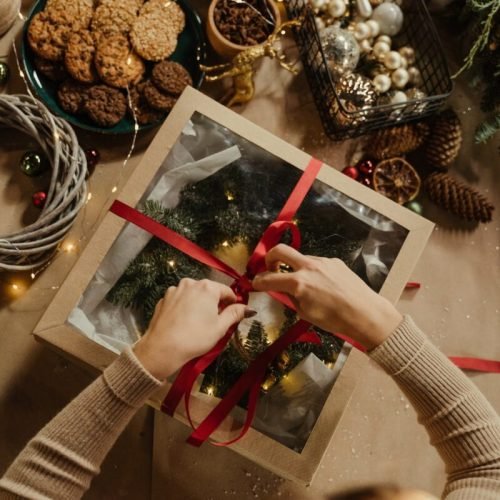 Photo by cottonbro studio on <a href="https://www.pexels.com/photo/red-and-white-ribbon-on-white-box-6063706/" rel="nofollow">Pexels.com</a>