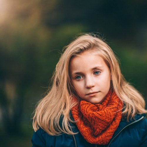 Photo by Janko Ferlic on <a href="https://www.pexels.com/photo/girl-wearing-orange-scarf-selective-focus-photography-618669/" rel="nofollow">Pexels.com</a>