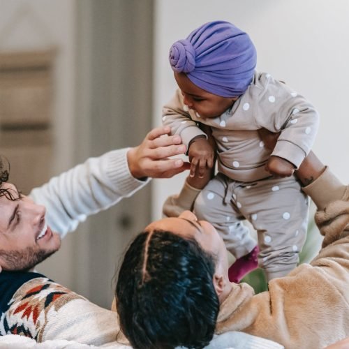 Photo by William  Fortunato on <a href="https://www.pexels.com/photo/happy-multiethnic-family-playing-with-toddler-girl-at-home-6393028/" rel="nofollow">Pexels.com</a>
