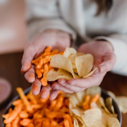 Photo by Tim  Samuel on <a href="https://www.pexels.com/photo/female-holding-tasty-snacks-in-hands-6696932/" rel="nofollow">Pexels.com</a>