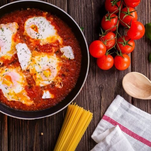 Photo by Dana Tentis on <a href="https://www.pexels.com/photo/black-frying-pan-with-spaghetti-sauce-near-brown-wooden-ladle-and-ripe-tomatoes-691114/" rel="nofollow">Pexels.com</a>
