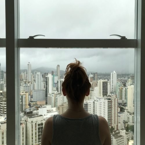 Photo by Fernanda Latronico on <a href="https://www.pexels.com/photo/woman-standing-near-glass-window-763849/" rel="nofollow">Pexels.com</a>