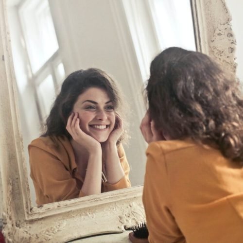 Photo by Andrea Piacquadio on <a href="https://www.pexels.com/photo/photo-of-woman-looking-at-the-mirror-774866/" rel="nofollow">Pexels.com</a>