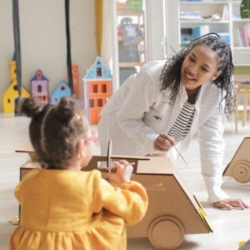 Photo by Ron Lach on <a href="https://www.pexels.com/photo/a-woman-in-white-blazer-talking-to-her-student-8540373/" rel="nofollow">Pexels.com</a>